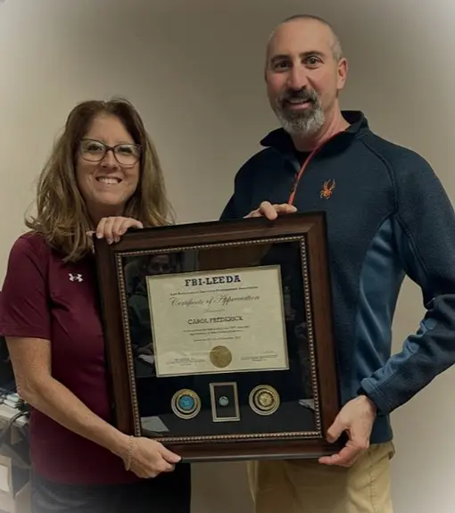 Plaque for teaching 100 classes with FBI Leeda